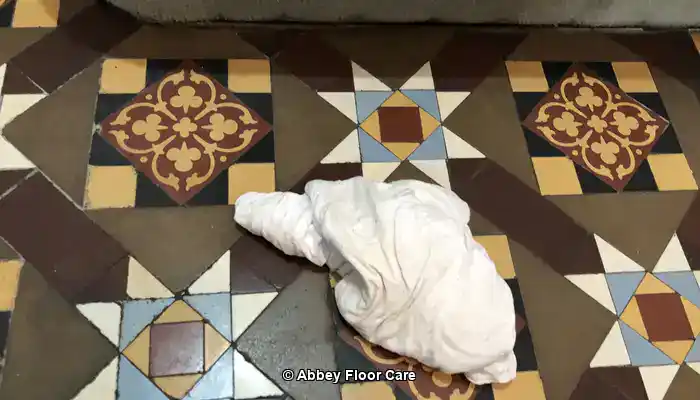 Understanding Victorian Tile Restoration, Abbey Floor Care restoring the colour to a Victorian clay tile floor using a colour-enhancing impregnating sealer