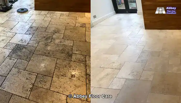 Tumbled travertine floor showing visible before-and-after contrast after professional restoration.